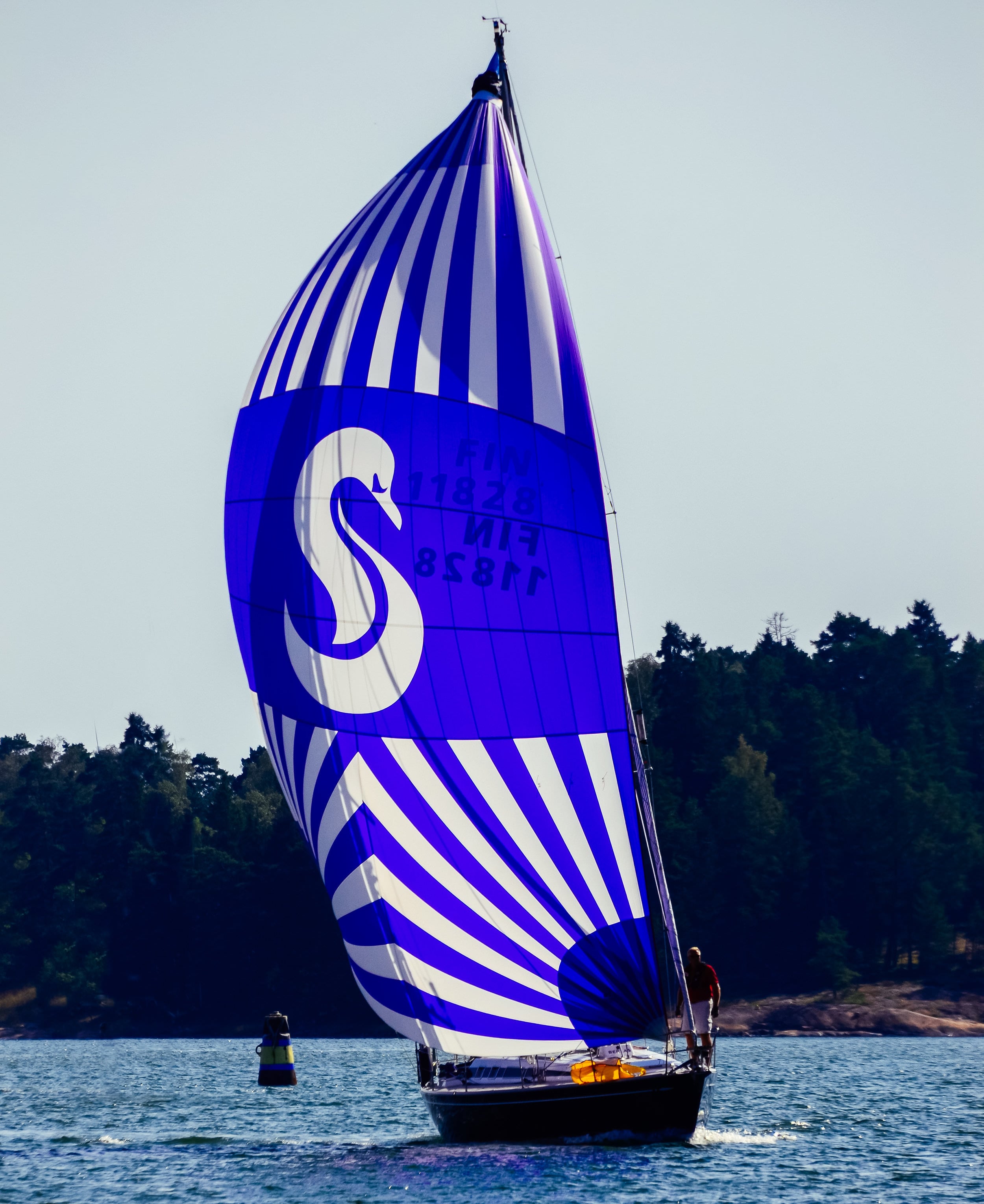 Cruising Spinnaker 9 Swan 40 Berla under a colorful cruising spinnaker
