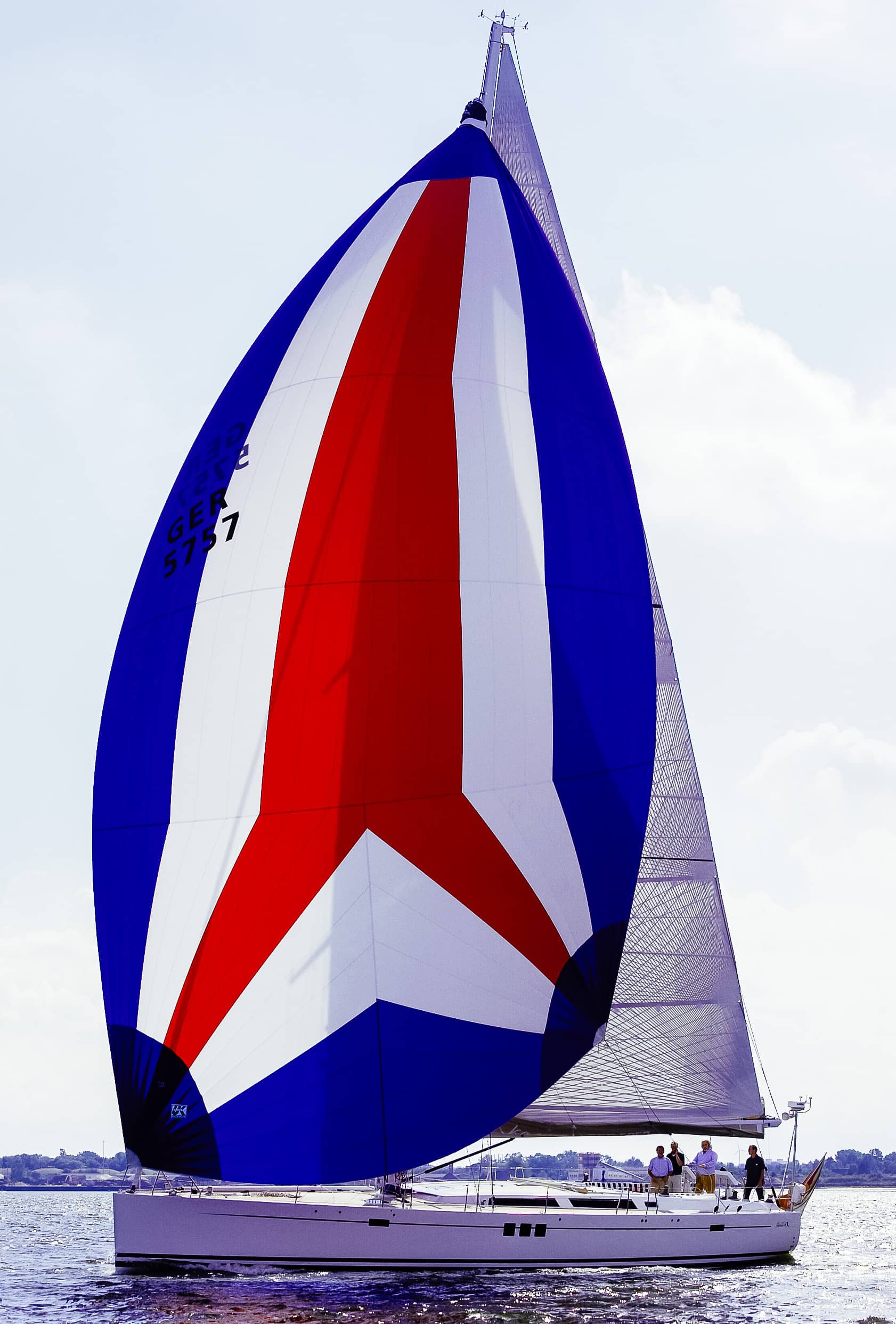 Cruising Spinnaker 5 Hanse 630 flying a colorful cruising spinnaker