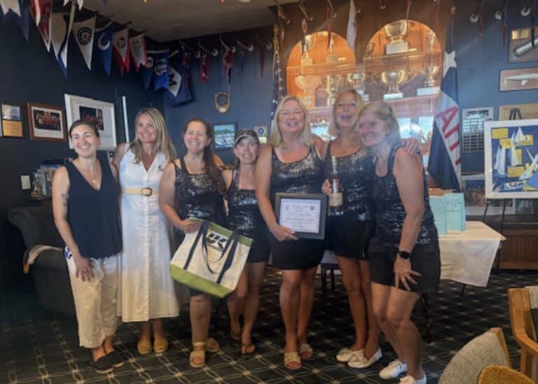 Racing and Winning for a Cause 11 Elaine Haher and the crew of A Better Hair Day collect their UK Sailmakers Northeast prize after winning the Spinnaker Division.